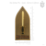 We Strike Pin Gold 63mm